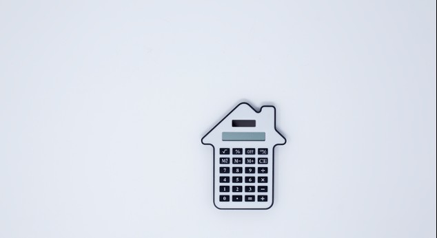A calculator shaped like a houseAI-generated content may be incorrect.