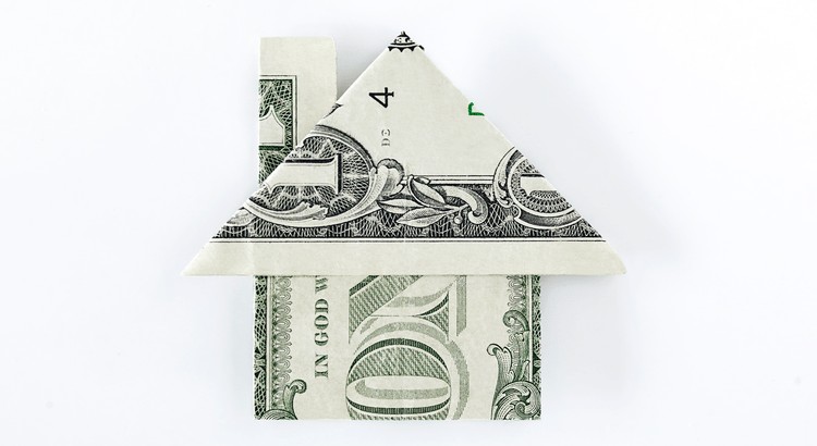 A paper money folded into a houseAI-generated content may be incorrect.